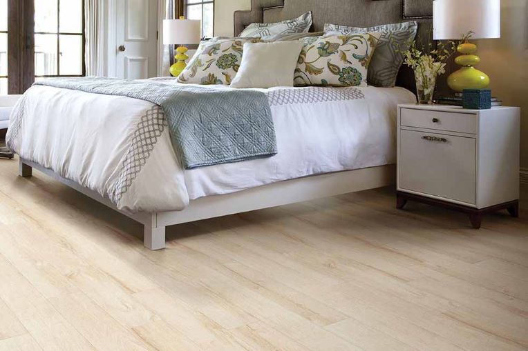 wood look laminate in a bright bedroom